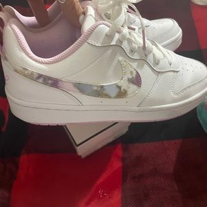 Woman’s size 8.5 Nike floral sneakers youth 6.5